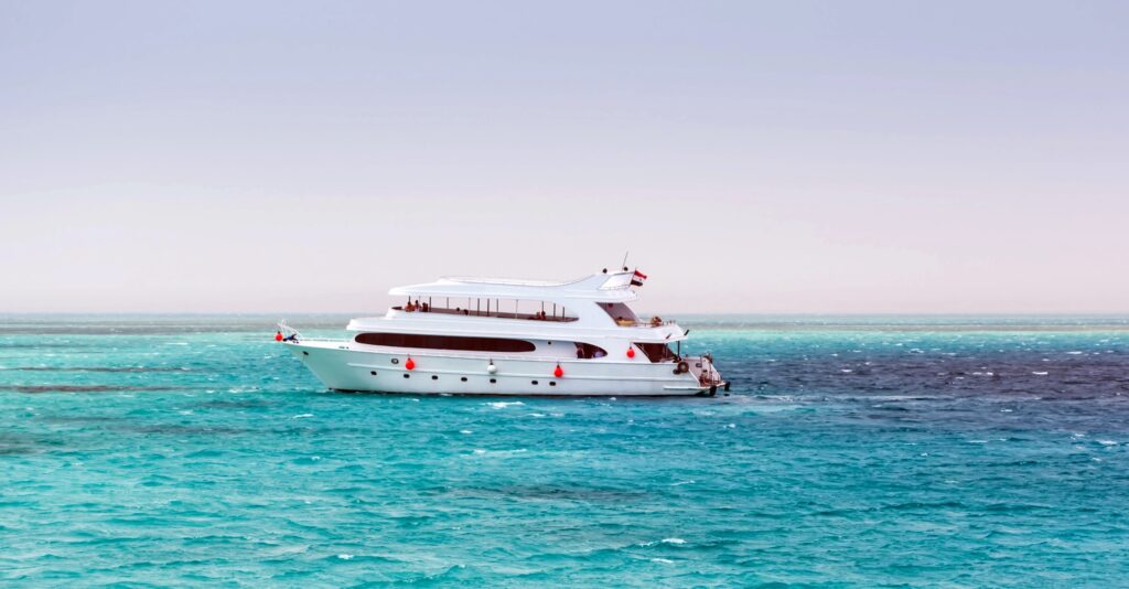 Motor yacht on turquoise water in the Red Sea off Egypt