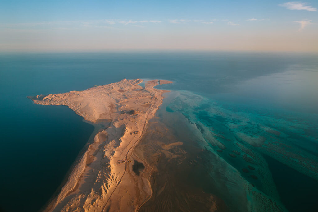 Aerial view of Ras Mohammed at the southern tip of Sinai, with desert meeting the reef in the Red Sea